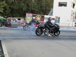 A pair of bikes doing a burnout