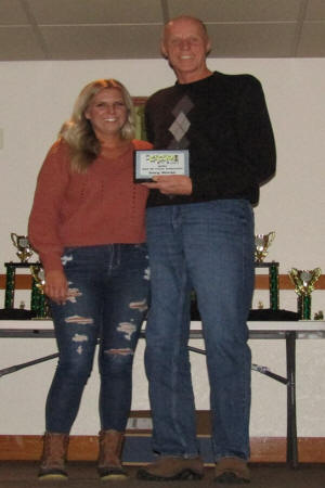 Gary & Sara at the banquet receiving Hof Plaque.jpg