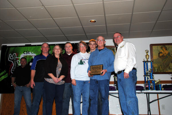 Larry Lyons & Family accepting his Hall of Fame Plaque